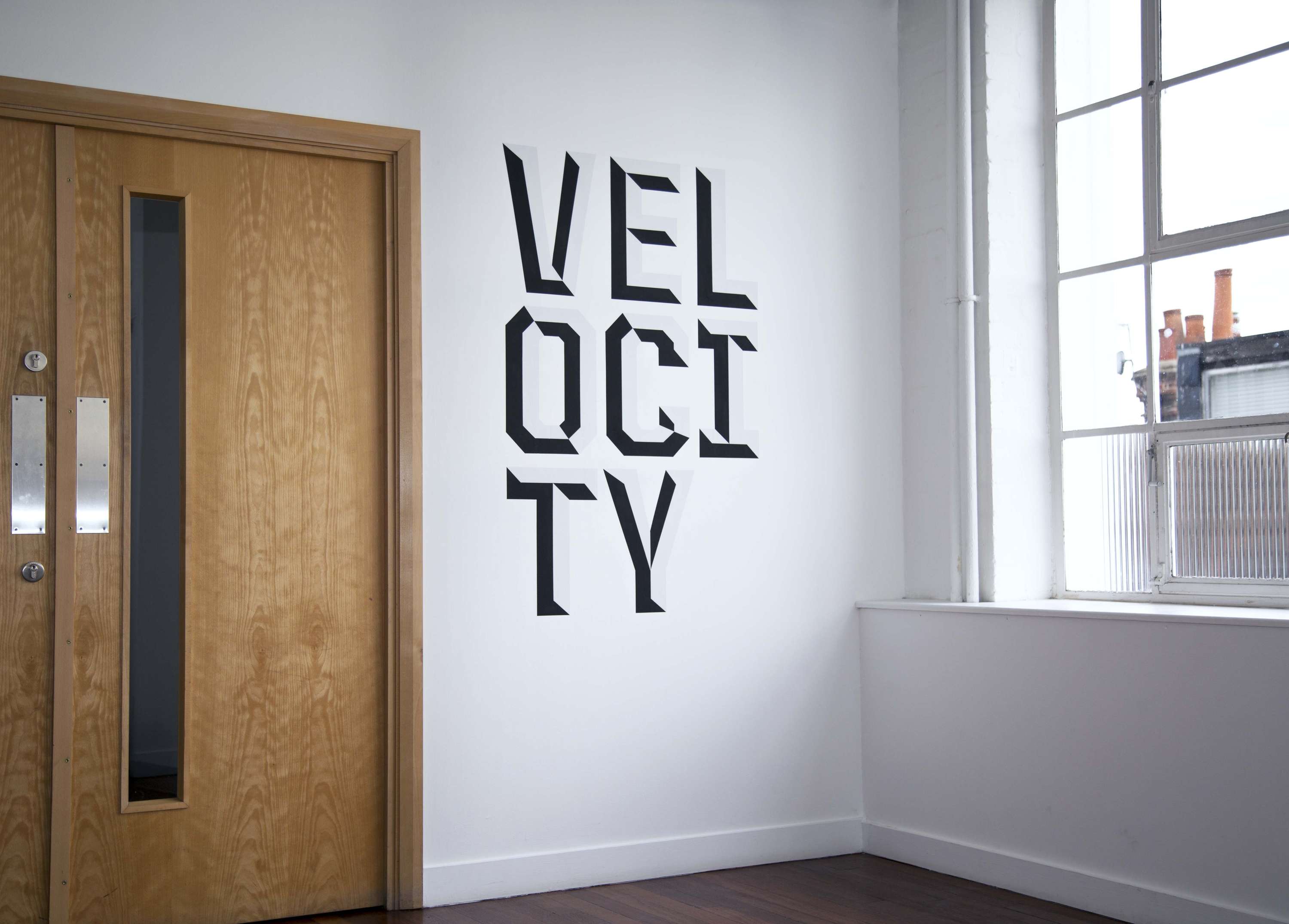 Velocity Sign and Mural by Oliver Warman