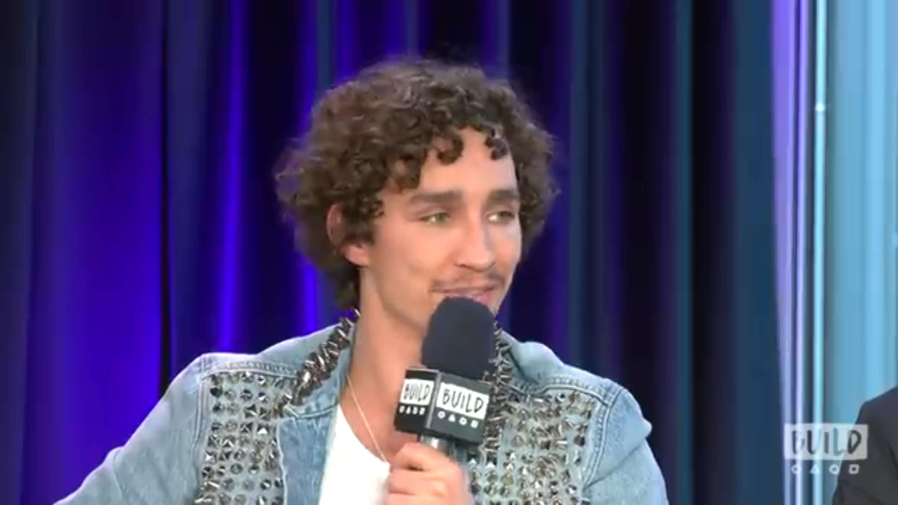 Robert Sheehan in a Levi's customised stud jacket by Qu Anne
