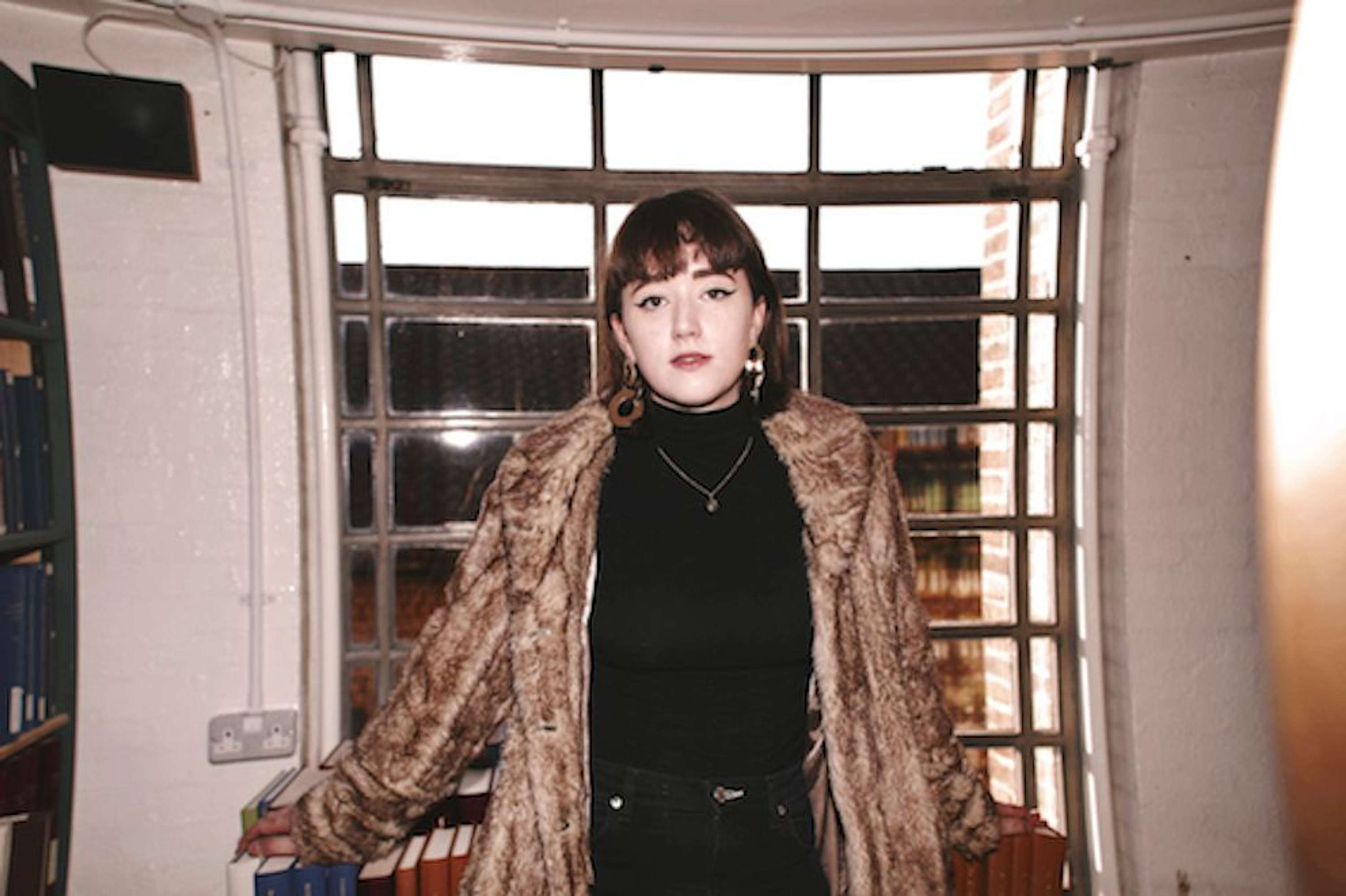 Photoshoot in Cambridge University Library by Sophie Coldicott