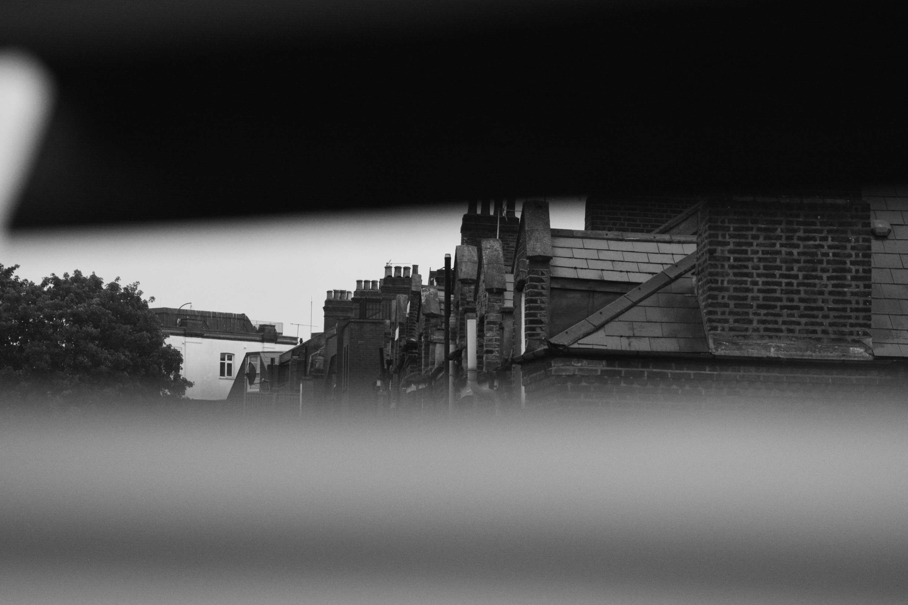 Photographs through a closing window by Alex Vezakiadis