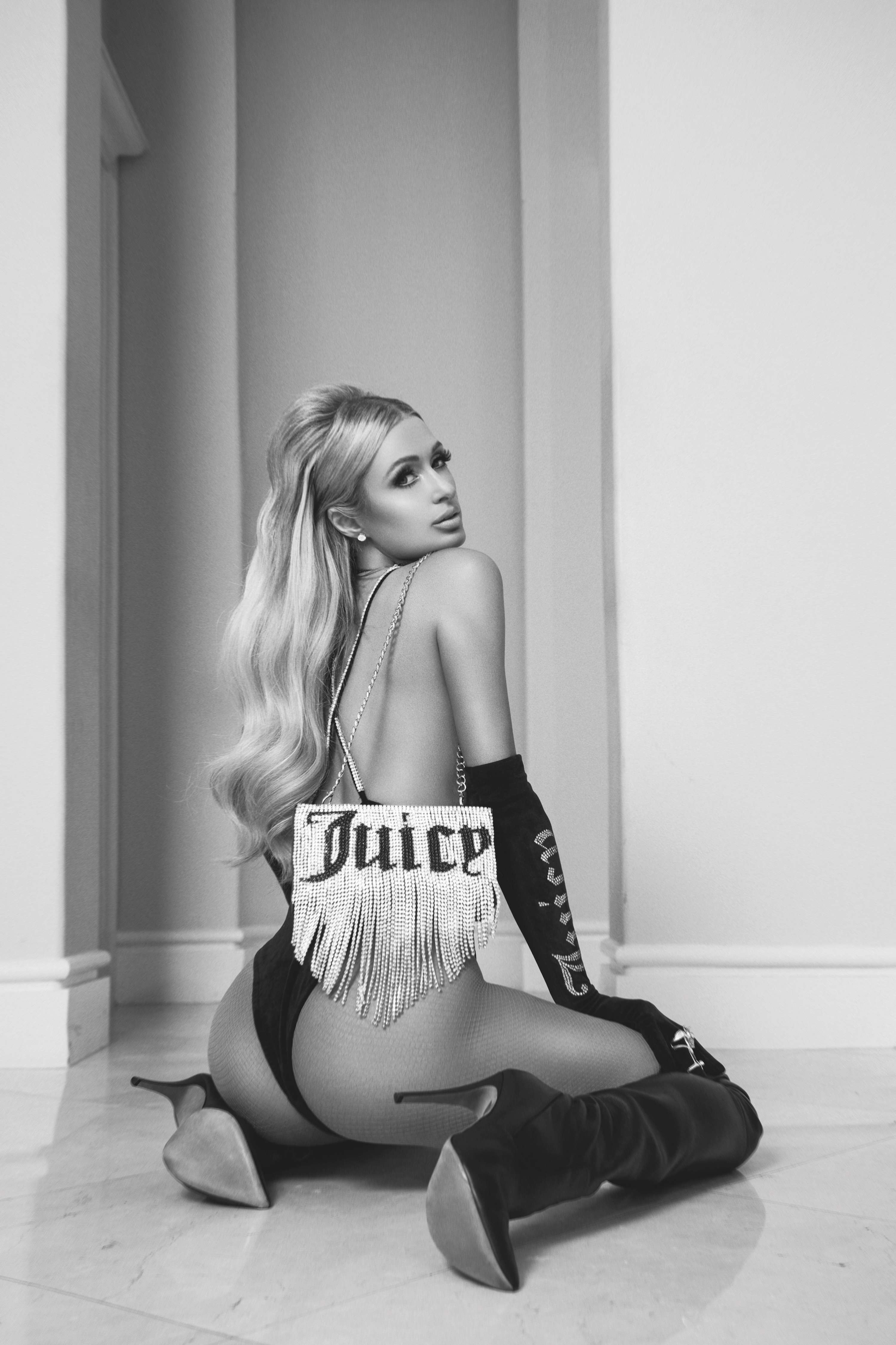 Paris Hilton wears Juicy Couture for Rollacoaster SS20 Issue