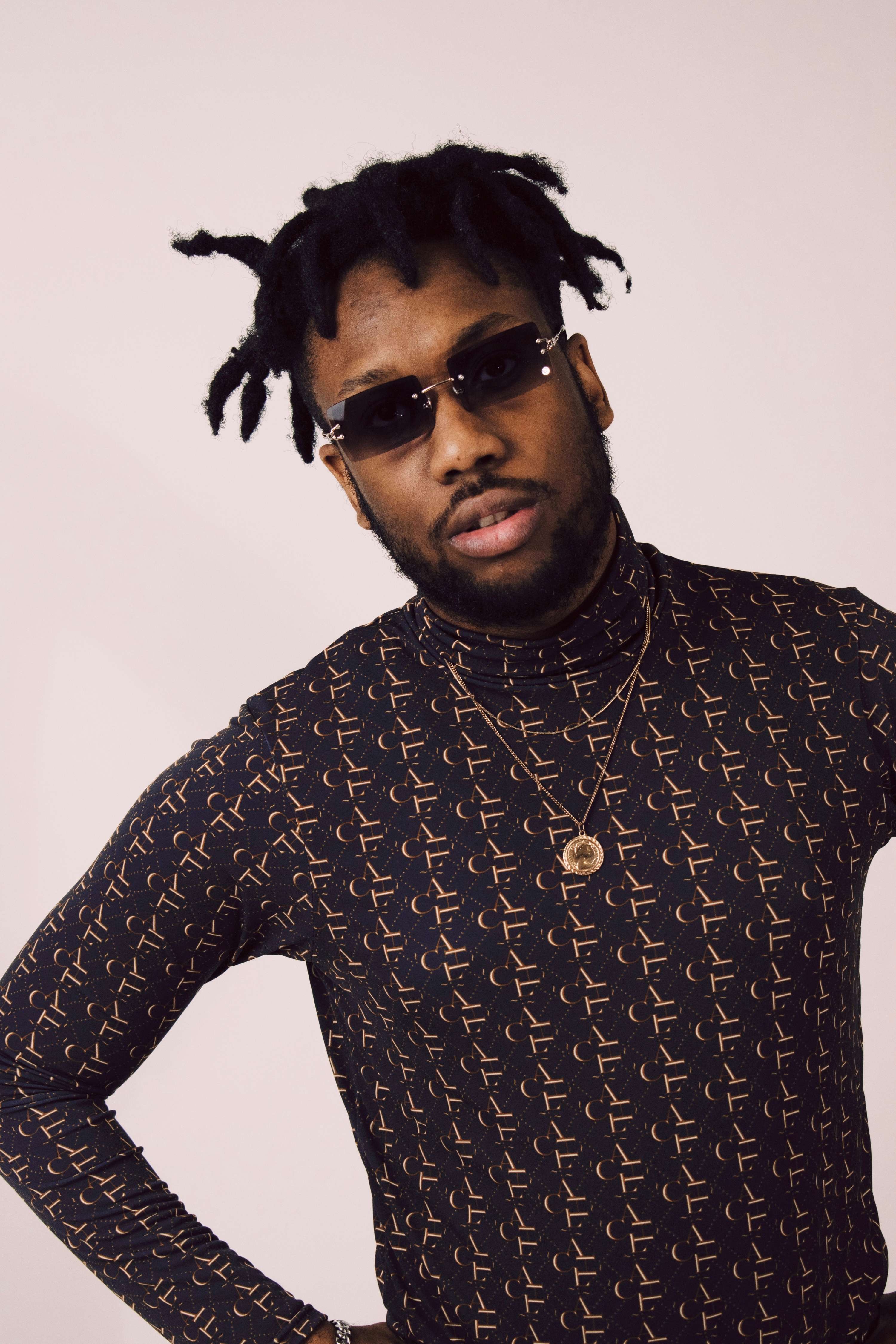 Monogram Turtleneck by ACHILLES