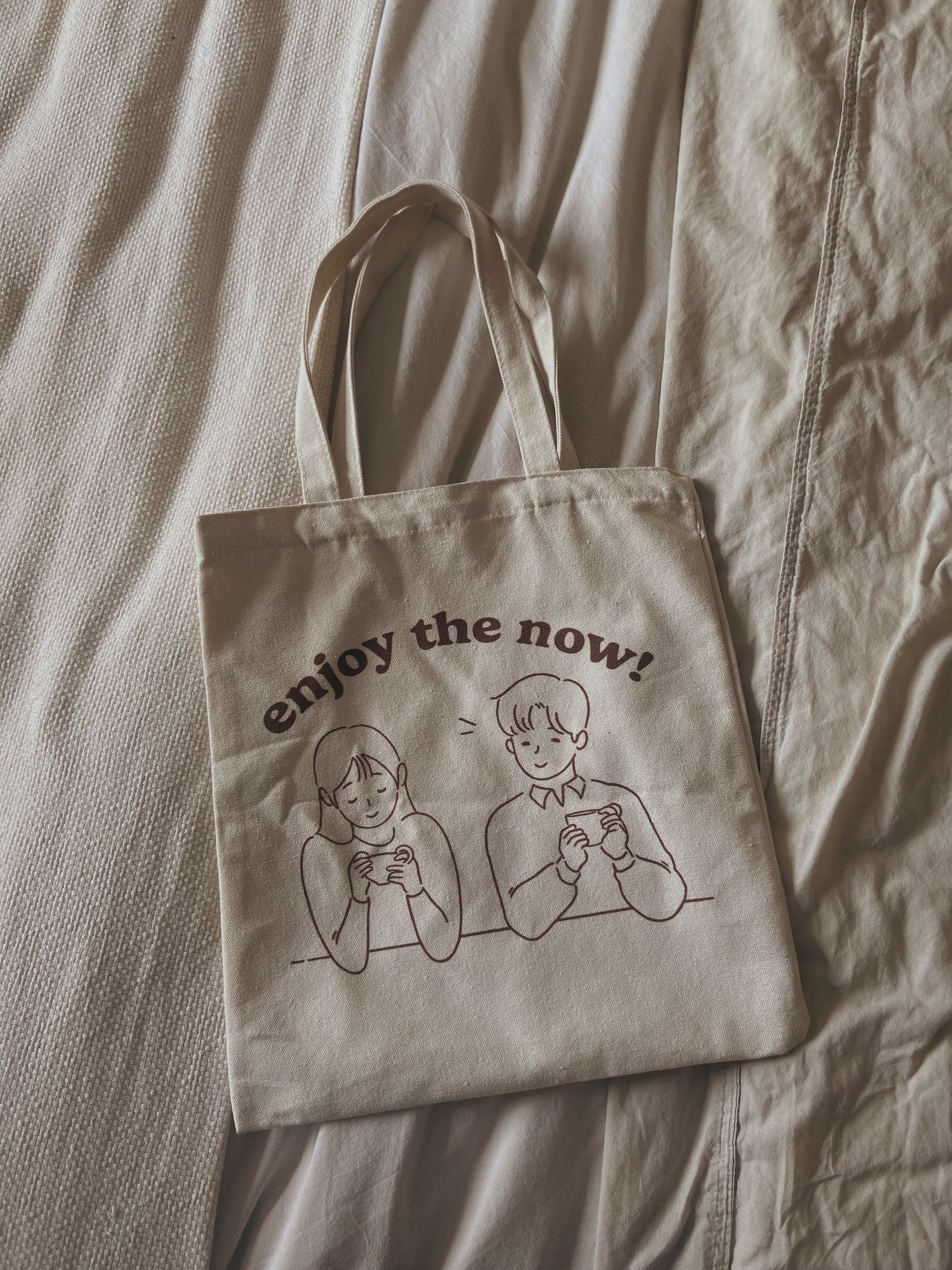 enjoy the now totes by Manny Singh