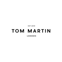 TOM MARTIN logo