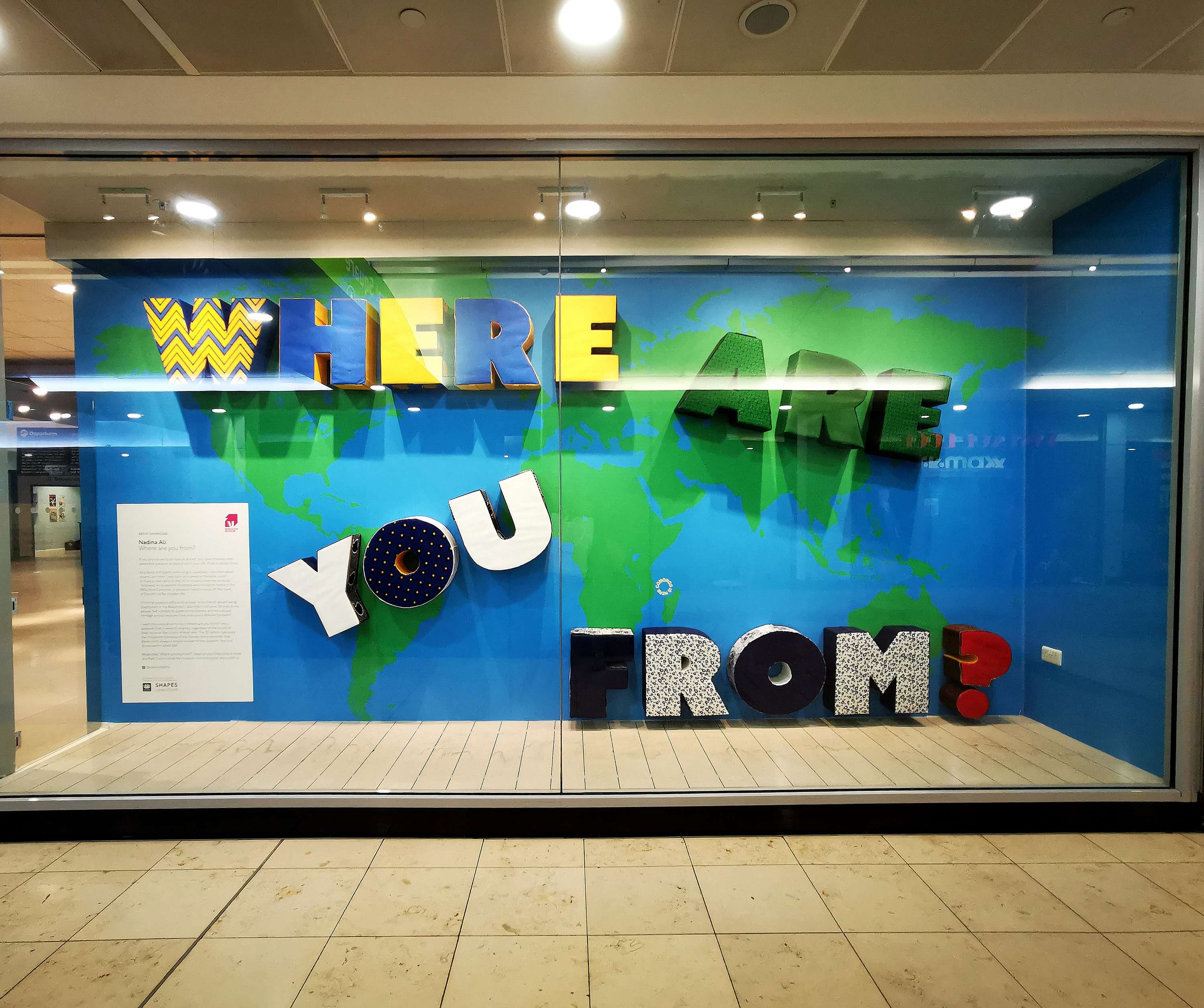 'Where Are You From?' window installation for the Migration Museum in Lewisham by Nadina Ali