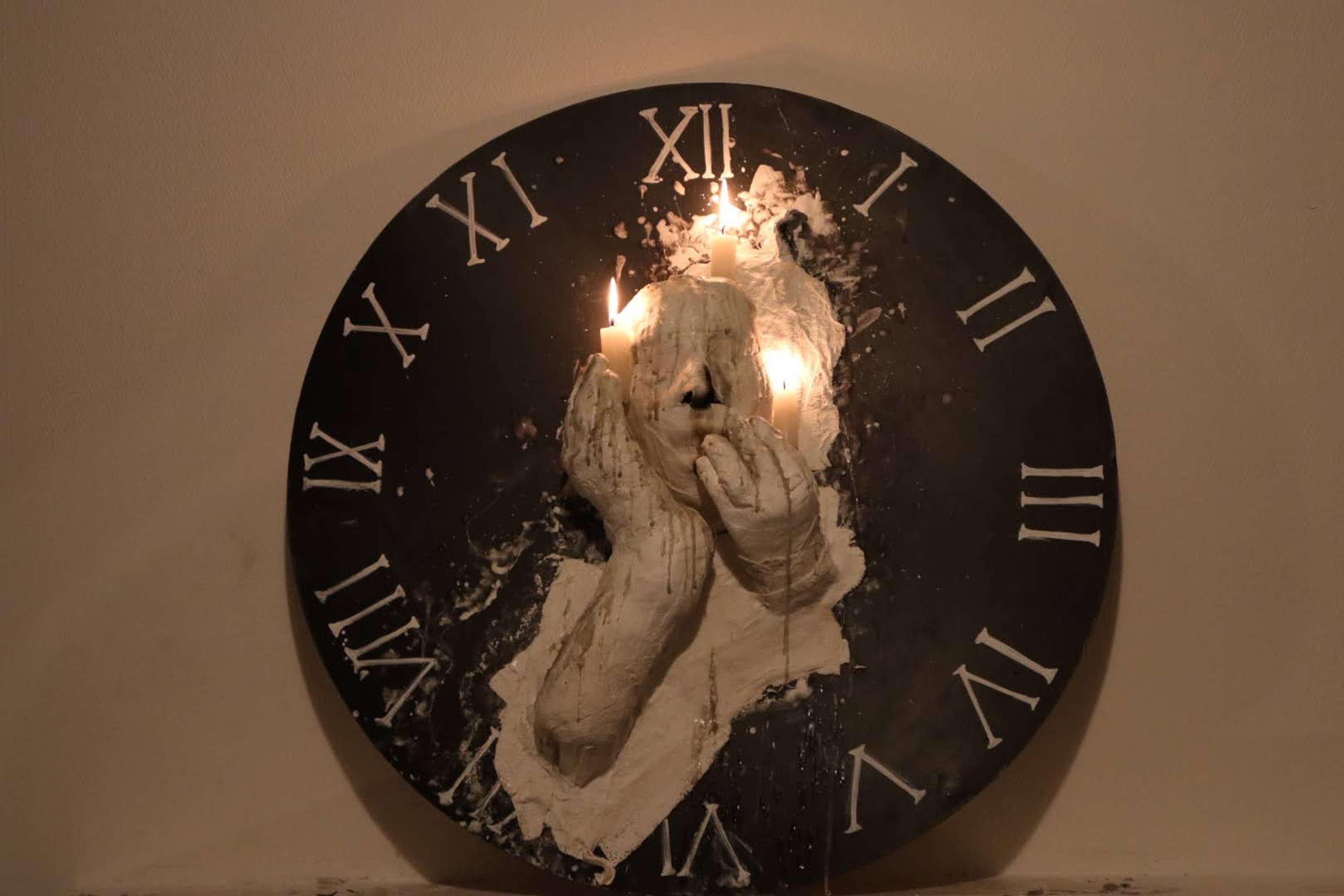 'Melting Man on a Roman Numeral Clock' by Ayoor Wassagou