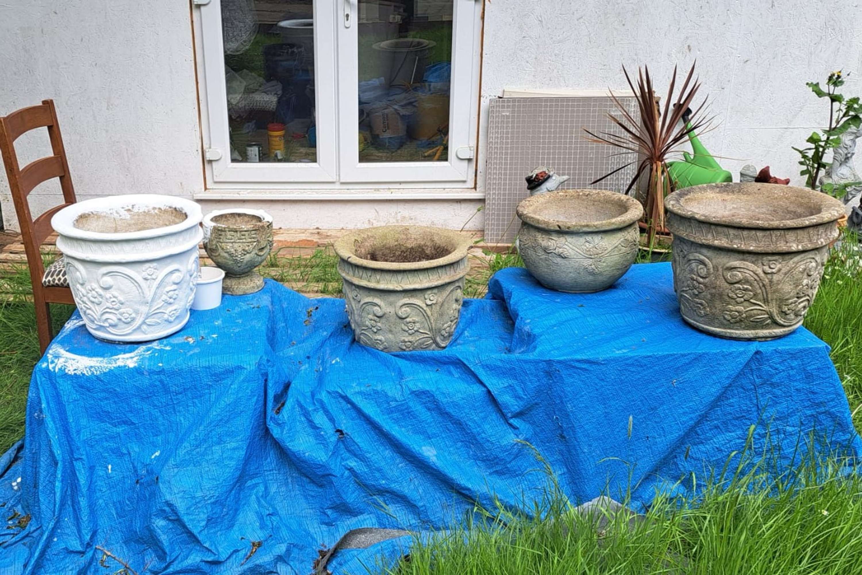 From Trash to Treasure; Transformation of Flower Pots by Evie Anderson
