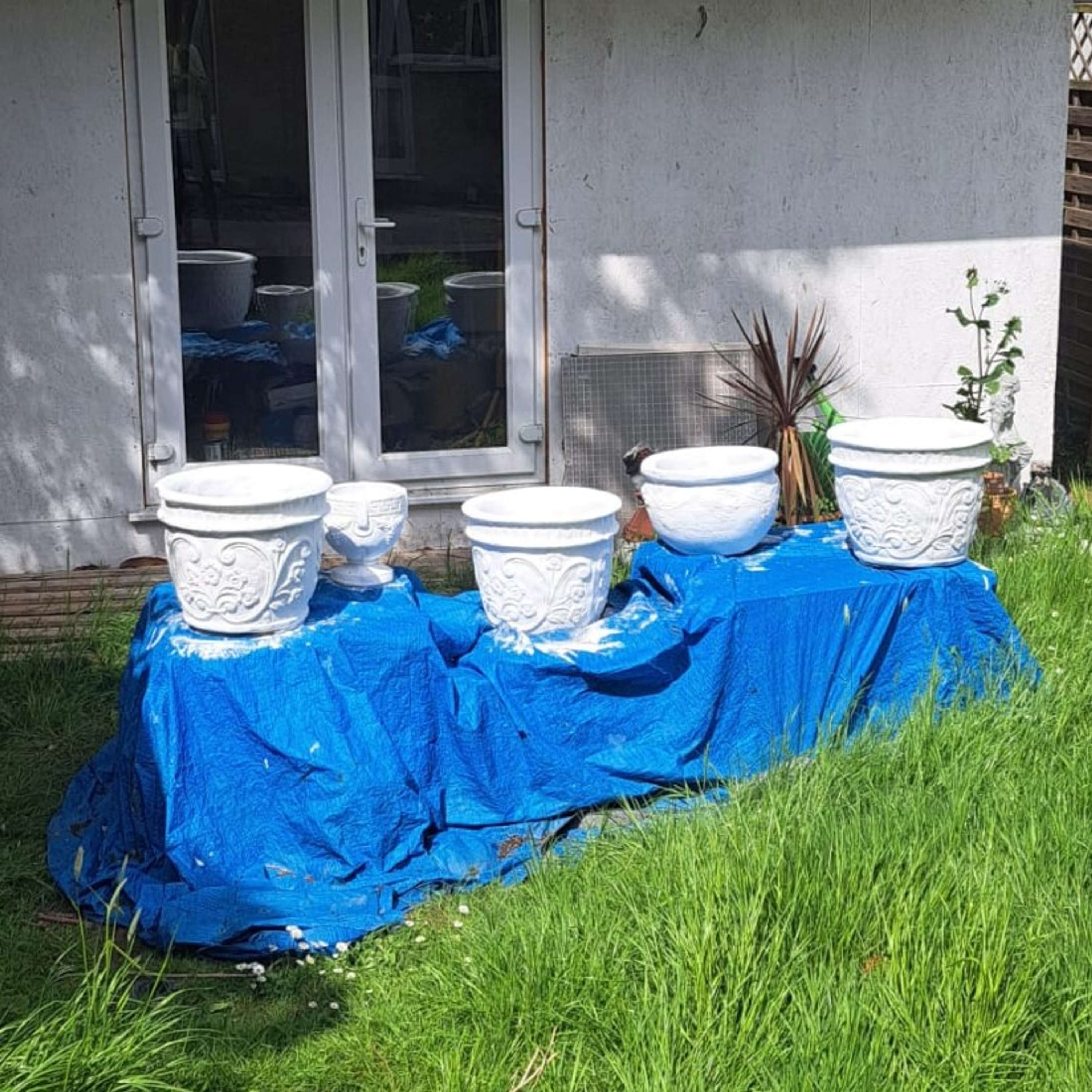 From Trash to Treasure; Transformation of Flower Pots by Evie Anderson