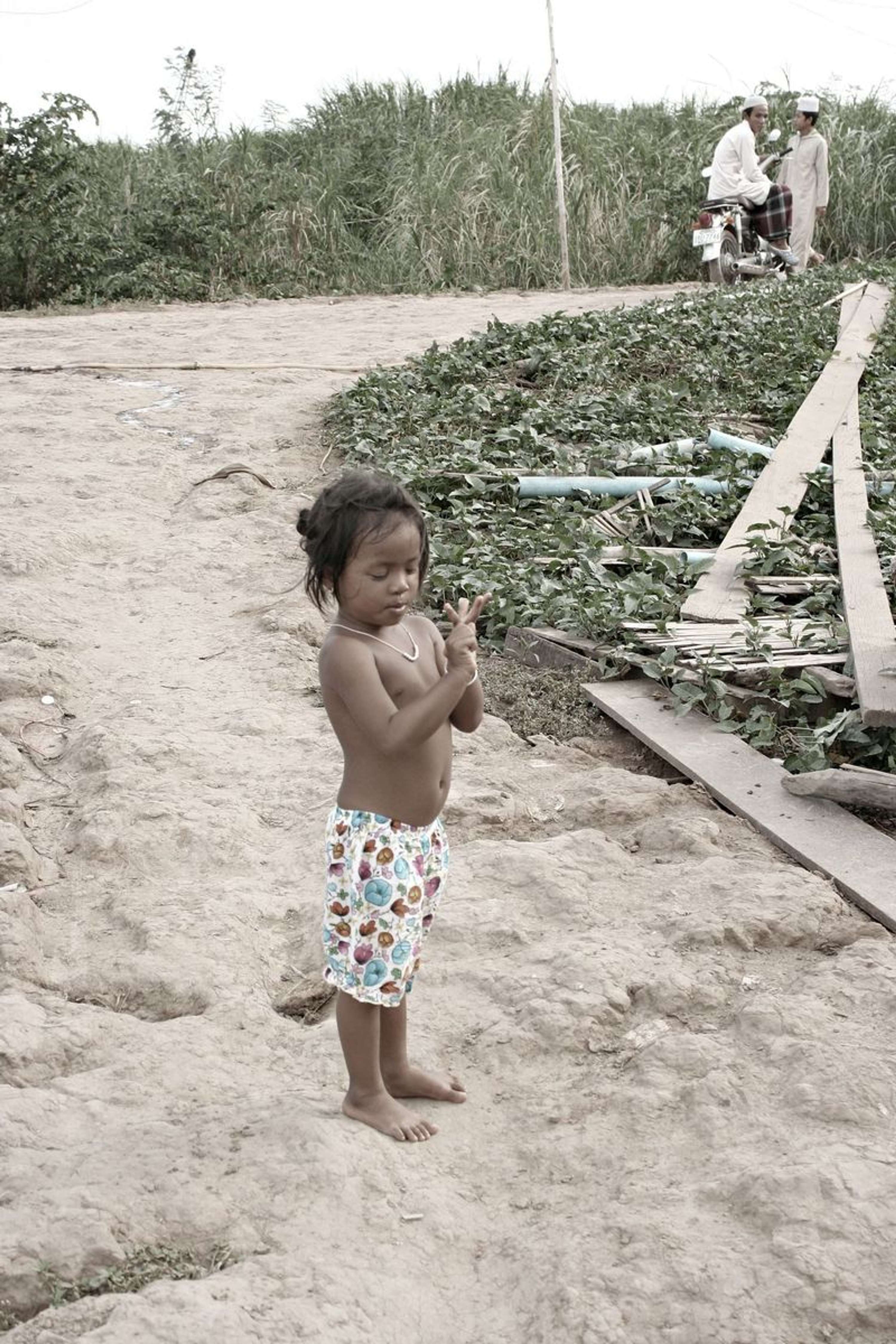 Cham River, Phnom Penh by Sarah Jane Enson